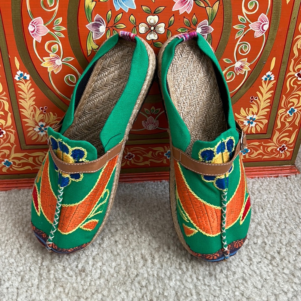 Socofy embroider slides with rubber bottoms.